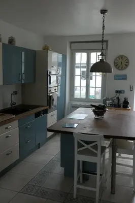 Cuisine ou kitchenette dans l'établissement La Maison d'Adonis à la mer
