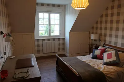 Un ou plusieurs lits dans un hébergement de l'établissement La Maison d'Adonis à la mer