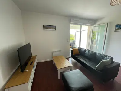Télévision ou salle de divertissement dans l'établissement Bel appartement en résidence - parking gratuit