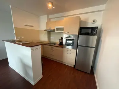 Cuisine ou kitchenette dans l'établissement Bel appartement en résidence - parking gratuit