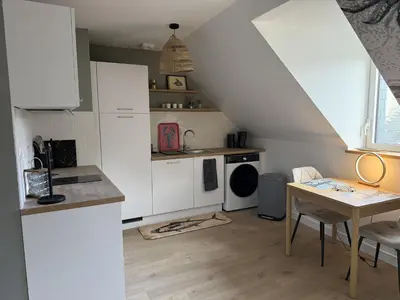 Cuisine ou kitchenette dans l'établissement Au Homard Suspendu