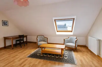 Coin salon dans l'établissement Au calme, à 50m de la plage