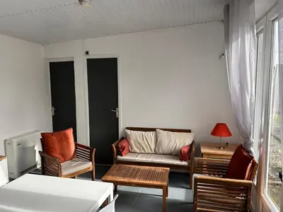 Coin salon dans l'établissement Charmante maisonnette proche de la mer