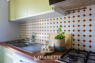 Cuisine ou kitchenette dans l'établissement -BALUM- Maison Familiale a 150 des plages