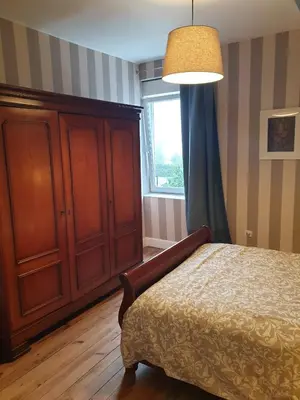 Un ou plusieurs lits dans un hébergement de l'établissement La Maison d'Adonis avec jacuzzi à Telgruc sur Mer