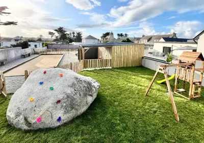 Jardin de l'établissement Villa d'exception piscine interieure plage à 300m 14 personnes