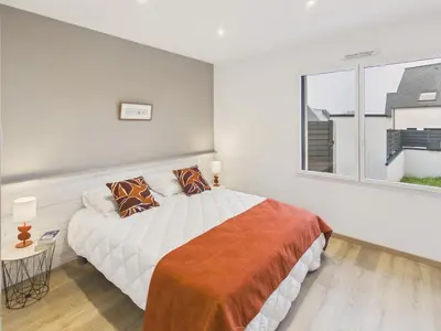 Un ou plusieurs lits dans un hébergement de l'établissement Maison neuve pour 6 avec jardin et terrasse