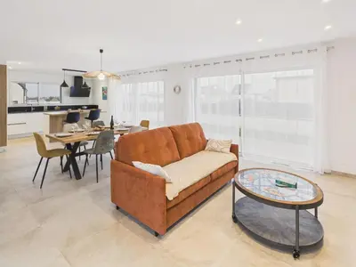 Coin salon dans l'établissement Maison neuve pour 6 avec jardin et terrasse