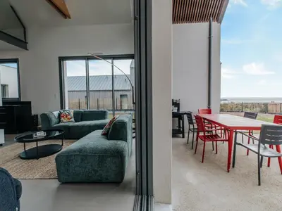 Coin salon dans l'établissement Architect-designed villa with sea view