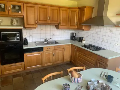 Cuisine ou kitchenette dans l'établissement Au calme en campagne à moins de 10 min de la plage