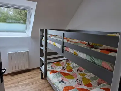 Un ou plusieurs lits dans un hébergement de l'établissement Gîte de kerscoff
