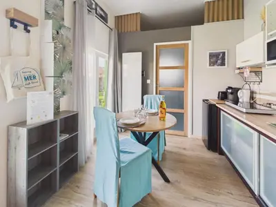 Cuisine ou kitchenette dans l'établissement Charmant gîte pour 2 avec jardin