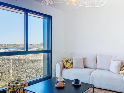 Coin salon dans l'établissement Holiday Home Ty Béthanie by Interhome