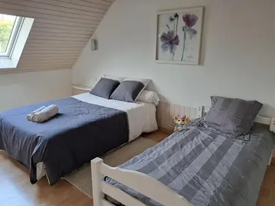 Un ou plusieurs lits dans un hébergement de l'établissement Gîte nature et mer, proche Brest et abers