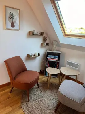Télévision ou salle de divertissement dans l'établissement Maison Familiale Bord de Mer