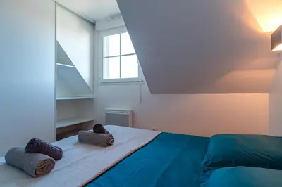 Un ou plusieurs lits dans un hébergement de l'établissement Pentrez Cottage - 600m de la Plage