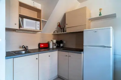Cuisine ou kitchenette dans l'établissement Pentrez Cottage - 600m de la Plage