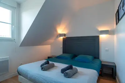 Un ou plusieurs lits dans un hébergement de l'établissement Pentrez Cottage - 600m de la Plage