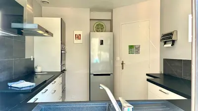 Cuisine ou kitchenette dans l'établissement Veranda - face à la mer - wifi