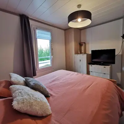 Un ou plusieurs lits dans un hébergement de l'établissement Chalet in Pont L'Abbé near Ile Tudy