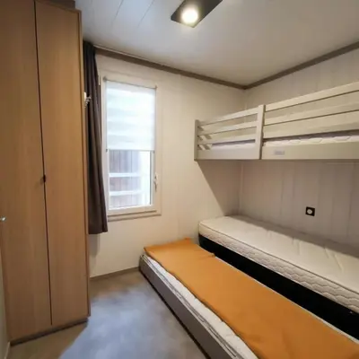 Un ou plusieurs lits dans un hébergement de l'établissement Chalet in Pont L'Abbé near Ile Tudy