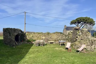 Jardin de l'établissement Charmante maison pour 7 sur la côte des légendes