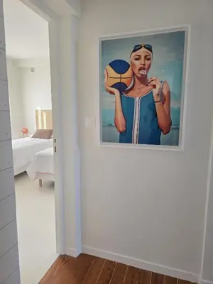 Un ou plusieurs lits dans un hébergement de l'établissement appartement confortable avec magnifique vue mer