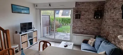 Télévision ou salle de divertissement dans l'établissement Maisonnette T3 TY DRENEC