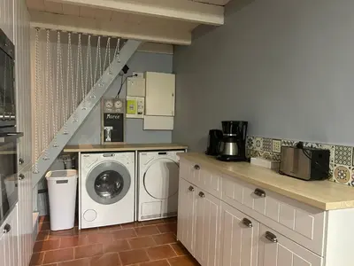 Cuisine ou kitchenette dans l'établissement Le Cottage du Cap