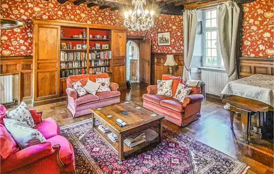 Coin salon dans l'établissement Cozy Home In Taulé With Kitchen