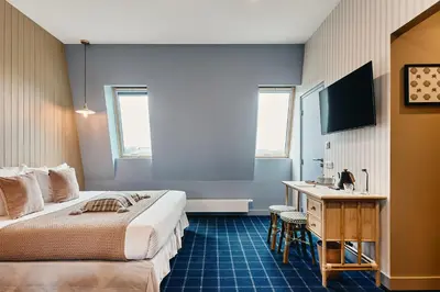 Un ou plusieurs lits dans un hébergement de l'établissement Hôtel de la Mer & Spa