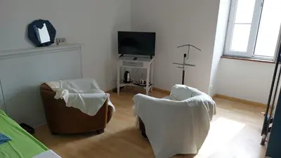 Télévision ou salle de divertissement dans l'établissement L'Eclose