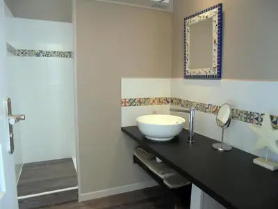 Salle de bains dans l'établissement La Dunette