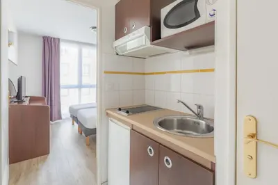 Cuisine ou kitchenette dans l'établissement Appart'City Confort Brest