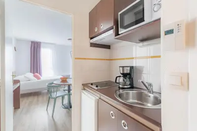 Cuisine ou kitchenette dans l'établissement Appart'City Confort Brest