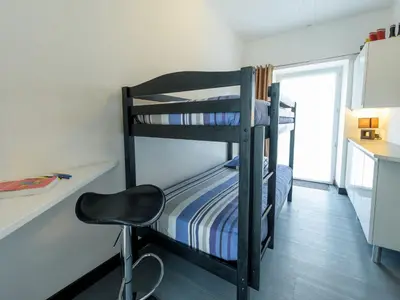 Un ou plusieurs lits dans un hébergement de l'établissement Holiday home with private pool