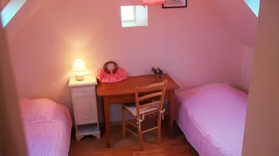 Coin salon dans l'établissement La Ferme de Poulpeye