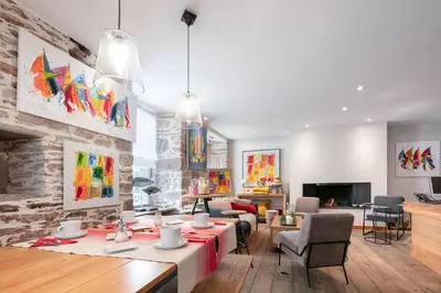 Coin salon dans l'établissement La Vinotière Chambres Appartements Spa