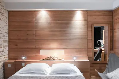 Un ou plusieurs lits dans un hébergement de l'établissement La Vinotière Chambres Appartements Spa