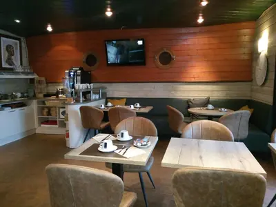 Cuisine ou kitchenette dans l'établissement Hotel Au Bout Du Monde
