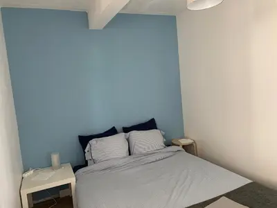 Un ou plusieurs lits dans un hébergement de l'établissement Appartement Design II - Port du Rosmeur -Douarnenez