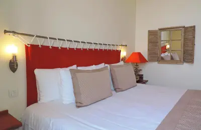 Un ou plusieurs lits dans un hébergement de l'établissement Hôtel Aux Tamaris - Vue Mer