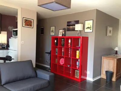 Coin salon dans l'établissement Duplex proche plage et centre ville