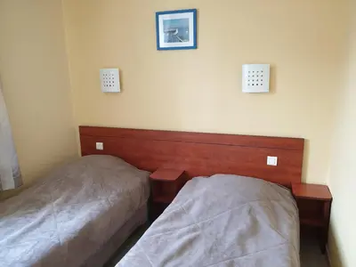 Un ou plusieurs lits dans un hébergement de l'établissement Hotel Restaurant Les Oceanides