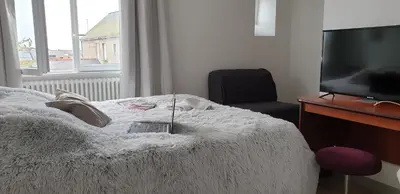 Télévision ou salle de divertissement dans l'établissement Hotel Restaurant Les Oceanides