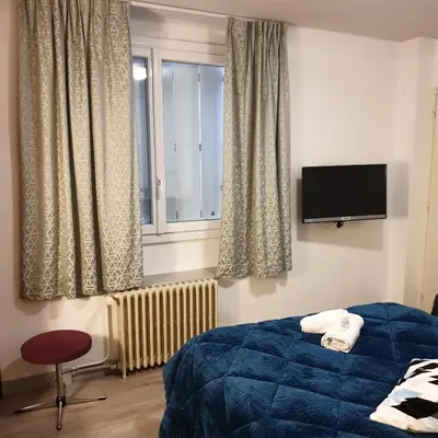 Un ou plusieurs lits dans un hébergement de l'établissement Hotel Restaurant Les Oceanides