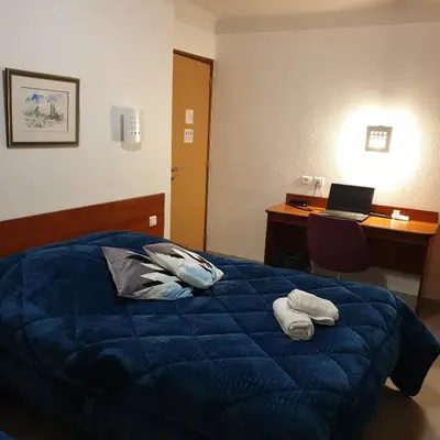 Un ou plusieurs lits dans un hébergement de l'établissement Hotel Restaurant Les Oceanides