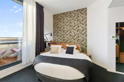 Un ou plusieurs lits dans un hébergement de l'établissement Best Western Plus Europe Hôtel Brest