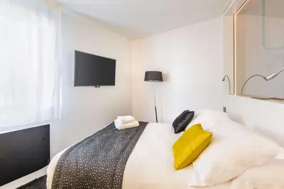 Un ou plusieurs lits dans un hébergement de l'établissement Best Western Plus Europe Hôtel Brest
