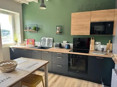 Cuisine ou kitchenette dans l'établissement Le Clos Du Pontic Logis et Cit'Hotel